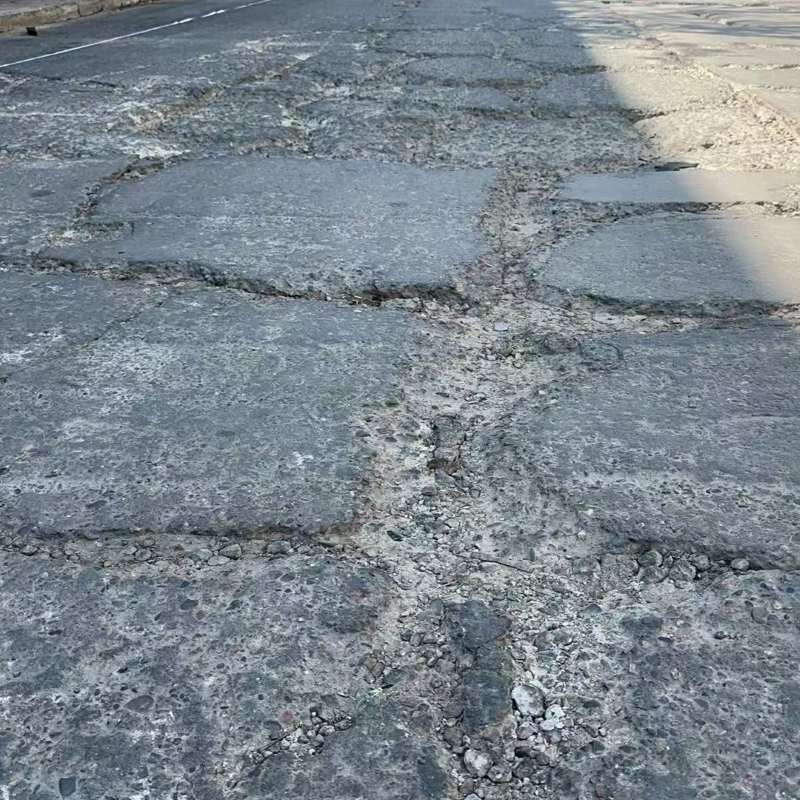 柳江路面起砂露石子修补料
